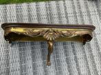 Antieke wandconsole, Ophalen