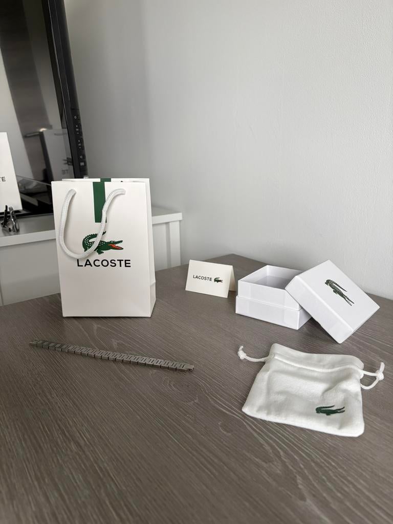 Lacoste armband, Handtassen en Accessoires, Armbanden, Zo goed als nieuw, Staal, Zilver, Verzenden