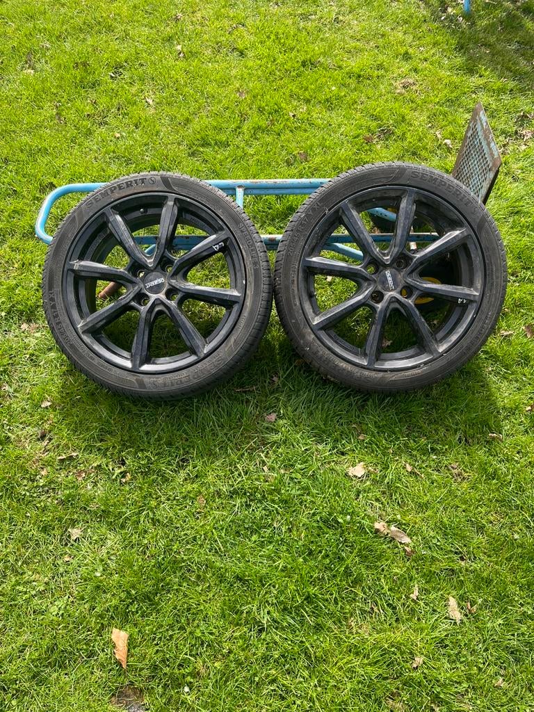 2 velgen 4x100 Dezent met goede banden, Ophalen, Band(en)