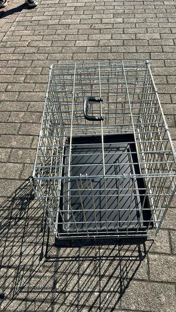 Te koop . Hondenbench . Zo goed als nieuw beschikbaar voor biedingen