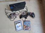 Playstation 2 met 2 spelletjes en 3 controllers