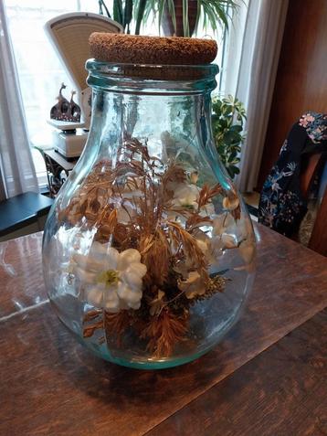 Grote bokaal met bloemen, Enlèvement, Utilisé