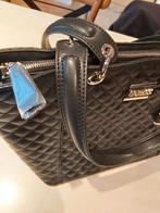 Nieuwe handtas, Enlèvement, Sac à main