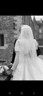 Trouwkleed 40/42, Ophalen