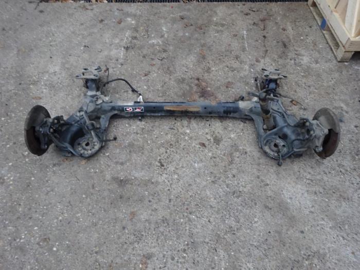 Achteras voorwielaandrijving van een Peugeot Partner, Auto-onderdelen, Remmen en Aandrijving, Peugeot, Gebruikt, 6 maanden garantie