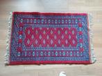 tapis oriental en laine, Ophalen