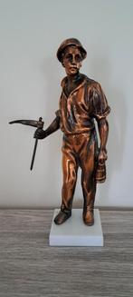 Mijnwerker op voet, Ophalen