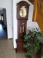 Mooie staande klok, Ophalen