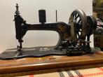 Antiek naaimachine, Ophalen