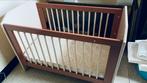 Houten kinderbedje, Enlèvement
