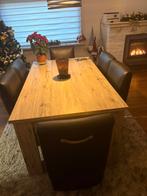 Tafel met 6 zwarte stoelen op wieltjes in prima staat., Ophalen, Zo goed als nieuw