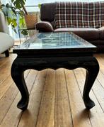 Aziatische salontafel, Ophalen