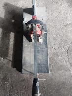 Tegelsnijder, Ophalen