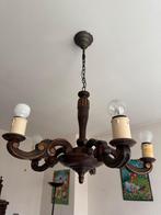 Antieke houten kroonluchter (kaarsenstijl), Ophalen