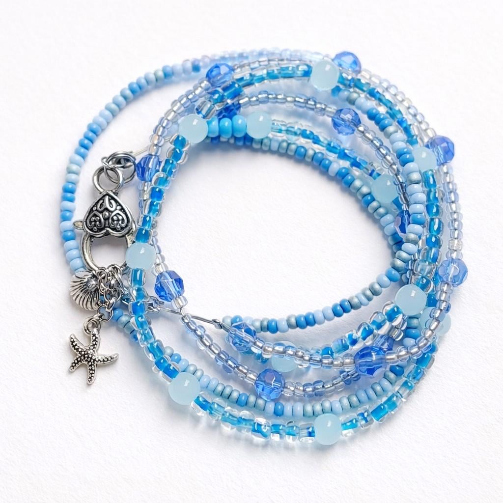 Nieuwstaat wikkelarmband blauw L 40cm armband L 4cm bedels, Ophalen, Overige materialen, Blauw, Nieuw