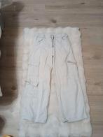 Witte broek met broekzakken meisjes, Ophalen