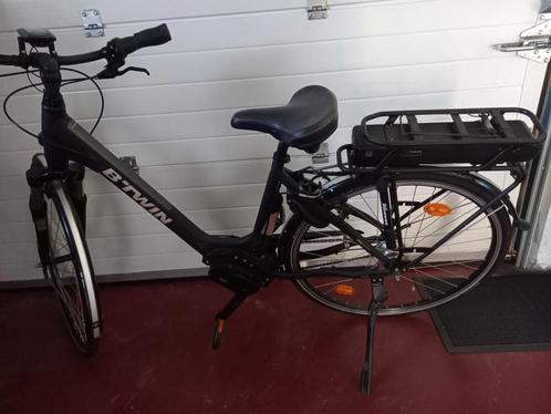 Btwin vélo électrique Dame noir taille L moteur central, Fietsen en Brommers, Elektrische fietsen, Zo goed als nieuw, 50 km per accu of meer