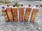 Lege antieke alcoholflessen (genever), Ophalen