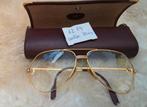 Cartier bril, Ophalen