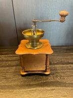 Oude antieke koffiemolen, Ophalen