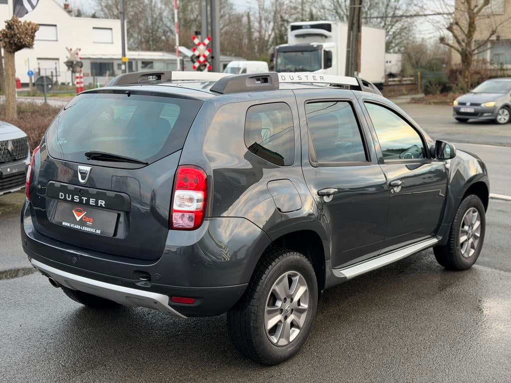 Dacia Duster benzine 1ste eig. Navi airco + keuring en gar., Bluetooth, Duster, Bedrijf, Onderhoudsboekje