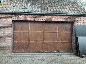 Porte basculante de garage.  disponible aux enchères