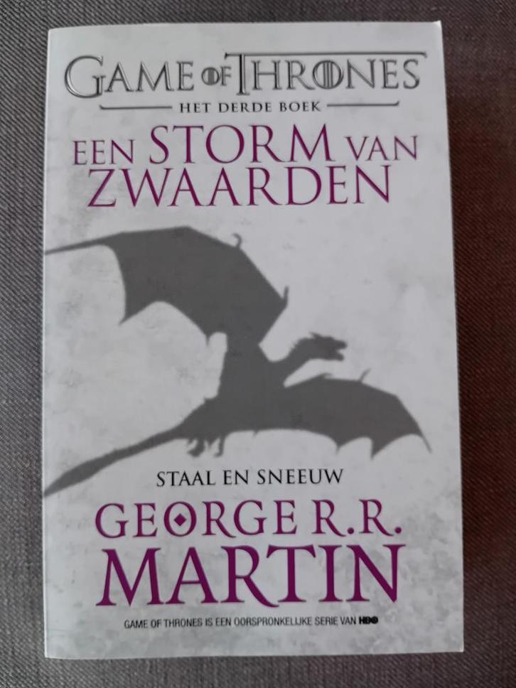 George R.R. Martin - Staal en sneeuw, Boeken, Fantasy, Zo goed als nieuw, Ophalen of Verzenden