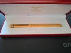 Stylo bille Cartier plaqué or jaune, Gebruikt, Balpen, Overige merken, Met doosje