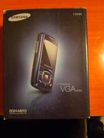 Samsung mgh-m610 in de doos met oplader en papier, Ophalen, Samsung