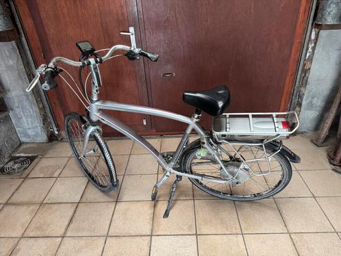 Electrische heren fiets, Fietsen en Brommers, Elektrische fietsen, Gebruikt, Sparta, 55 tot 59 cm, 30 tot 50 km per accu, Ophalen
