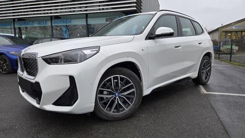 BMW IX1 EDRIVE20 M SPORTPAKKET 2024 13500 KM, Auto's, BMW, Particulier, Te koop, iX1, ABS, Achteruitrijcamera, Airbags, Airconditioning