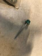 Golfplaatnagels met groene kunststofkap, Enlèvement