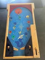 Houten flipperkast, Ophalen