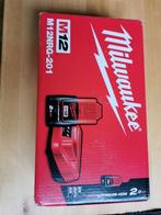 Milwaukee 12v oplader + 2Ah batterij, Ophalen, Zo goed als nieuw