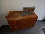Antieke naaimachine meubel, Ophalen