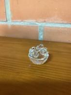 Swarovski vogelnestje, Ophalen