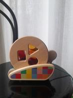 Houten trekfiguur slak, Bajo, Ophalen