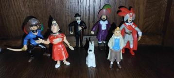 7 figurines Tintin (Vente à la pièce ou en lot). disponible aux enchères