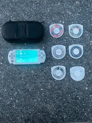 Sony PSP 2000 Silver Edition + 6 games & case beschikbaar voor biedingen