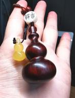 Hanger van natuurlijke rozenhout en amber, Ophalen of Verzenden, Nieuw, Overige materialen