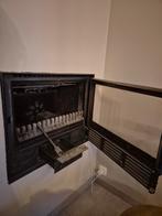 Flam houtkachel, Ophalen