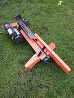 Akita houtsplitter, Ophalen