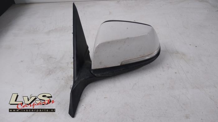 Rétroviseur extérieur gauche d'un BMW 1-Serie, Autos : Pièces & Accessoires, Rétroviseurs, BMW, Utilisé, 3 mois de garantie, Enlèvement ou Envoi