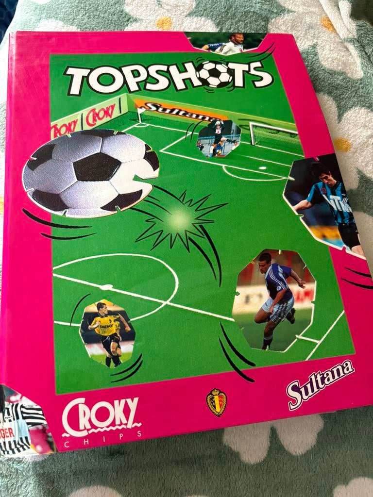 Topshots map met flippos, Enlèvement