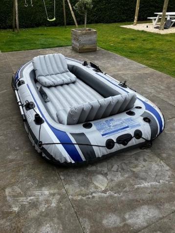 INTEX EXCURSION 4 OPBLAASBOOT + 2 ROEISPANEN + INFLATOR beschikbaar voor biedingen