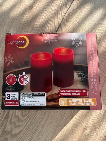 Ledkaarsen rood en wit beschikbaar voor biedingen