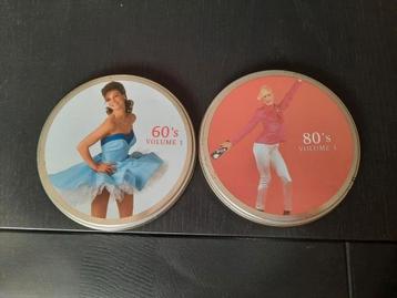 2 CD dans une boîte en fer blanc, jamais écoutés 