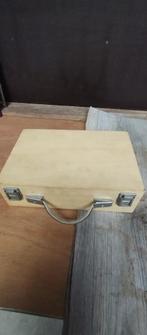 koffer voor petanque ballen, Ophalen