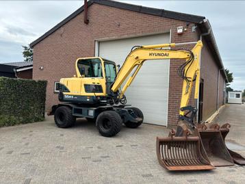 Hyundai 55W-9 mobiele kraan graafmachine 4 bakken beschikbaar voor biedingen