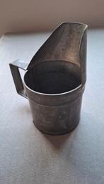 oude liter gebruikt om vet over te gieten, Ophalen